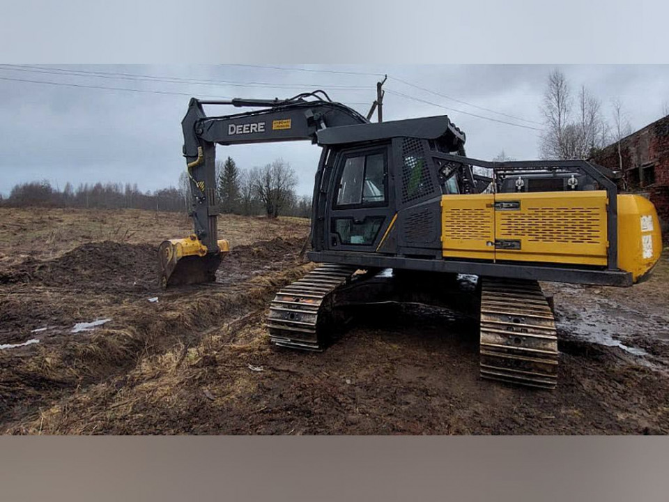  Гусеничный харвестер John Deere 260  