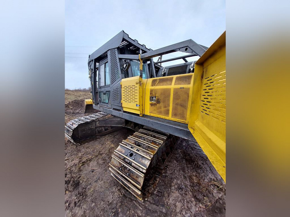 Гусеничный харвестер John Deere 260  